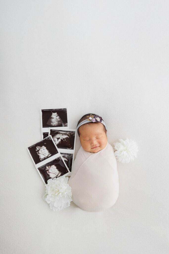 ニューヨークでニューボーンフォト/妊娠中のエコー写真と一緒に。