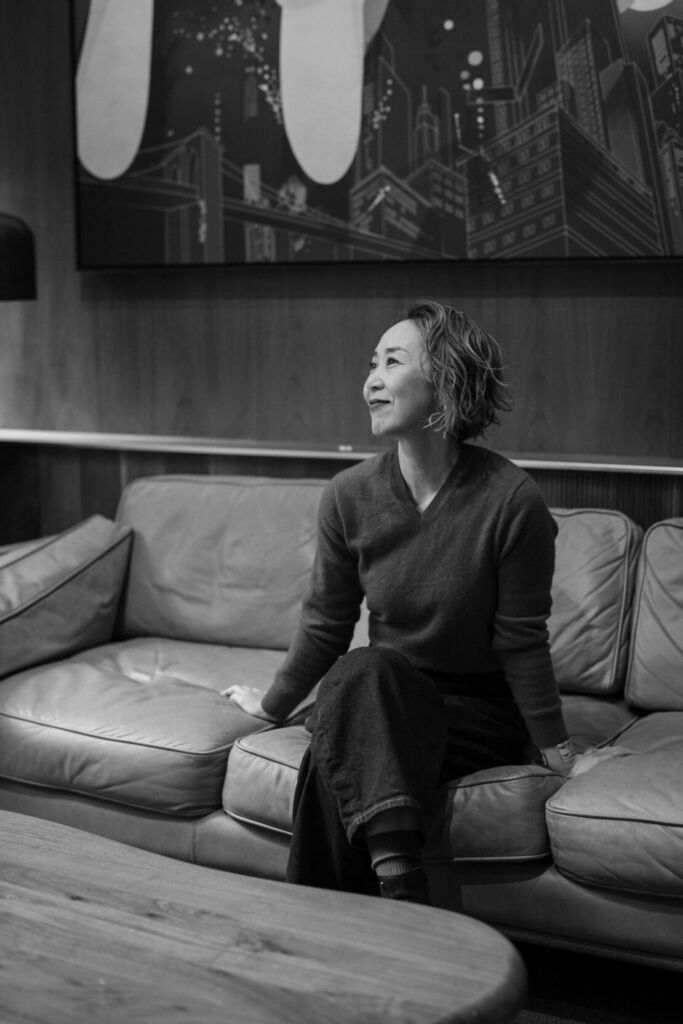 woman sitting on the cafe sofa